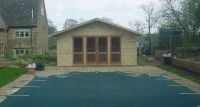 18 x 16 Summer Room with customers doors and sidelights, to be used as a changing room for the swimming pool. 