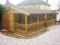 12 x 24 deep Pavilion split into 3 rooms. The gable ends feature access doors to the end rooms, with double doors in the middle for the main part. 