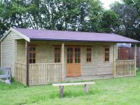 24 x 16 Pavilion with standard doors and windows. Featuring 2 internal partitions,each with a personal access door. 
