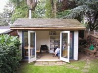 14 x 10 Orchard Room. Customer added Cedar Shingles, internal lining,  and Painted the building. 