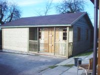 22 x 18 Pavilion with barn double doors and georgian windows. Internally featuring 2 partitions, each with personal doors.