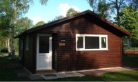 16 x 10 Studio with a white u-PVC door and white u-PVC windows. Customer painted the building after assembly.