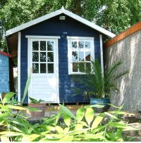 8 x 8 Summer Room with a 9 Pane door & a 9 Pane window. Customer painted the building after assembly.